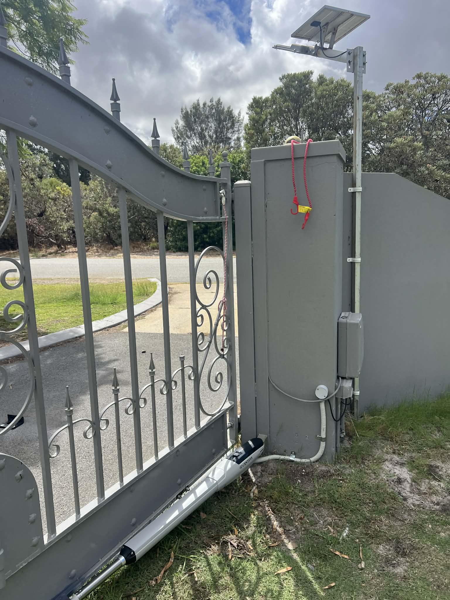 Swing gate automation with control cabinet