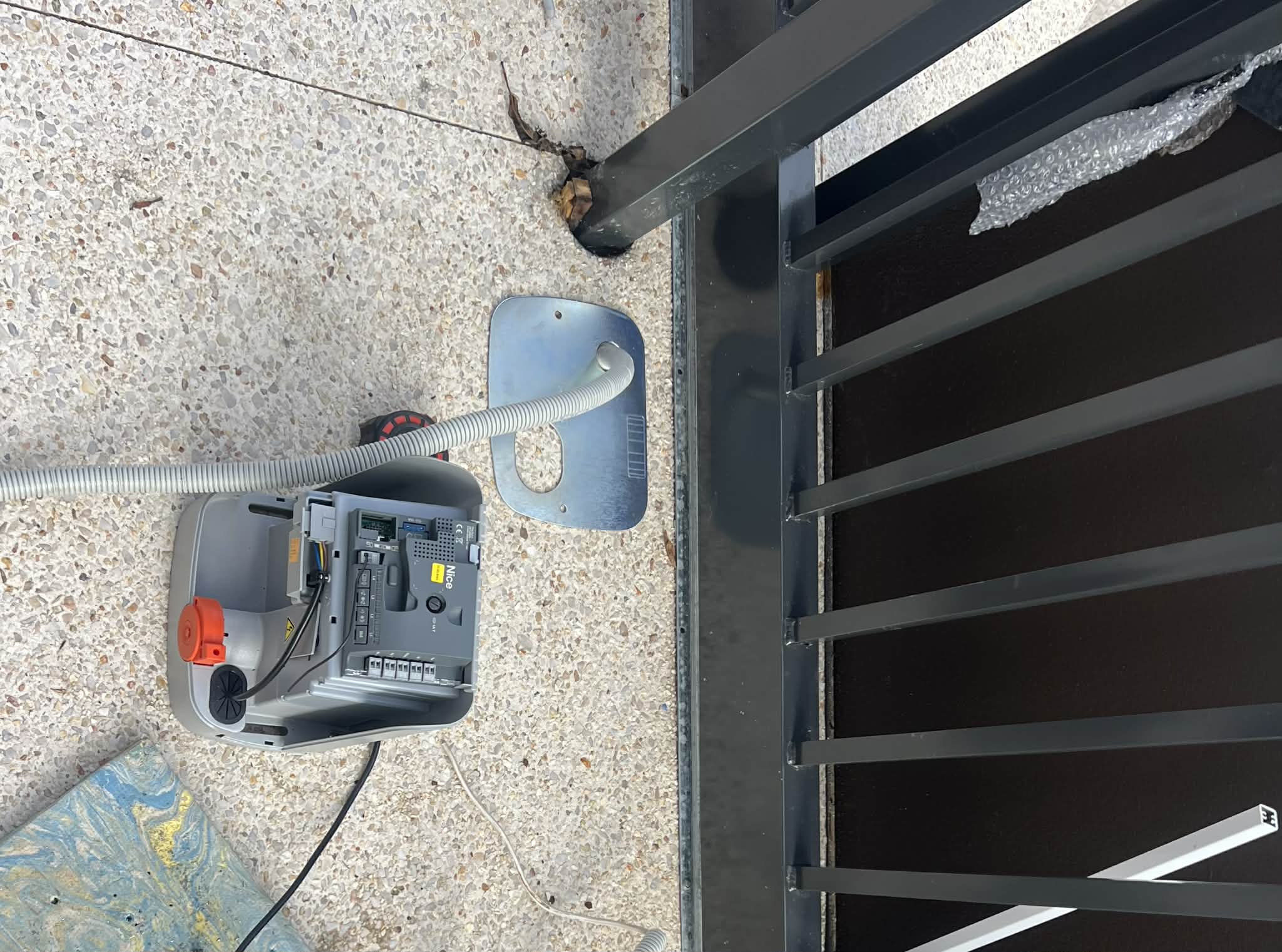 Gate control hardware mounted on site